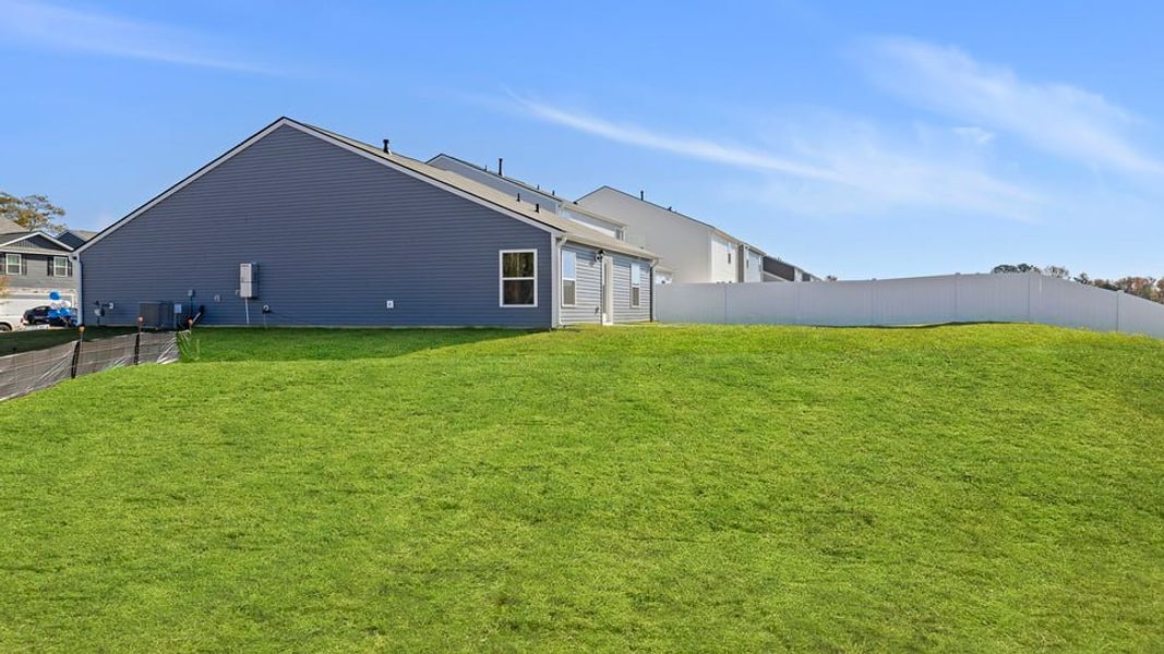Exterior details and patio area of a home in Harper Ridge, Roebuck (Image 20).