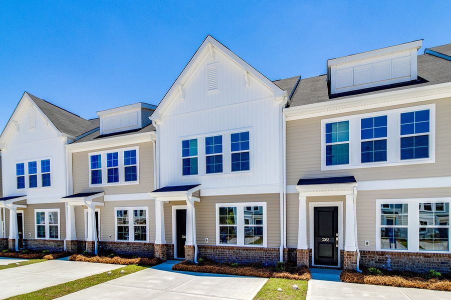 Front exterior of a new home in Astoria, Columbia, SC, highlighting curb appeal (Image 18). Front exterior of a new home in Astoria, Columbia, SC, highlighting curb appeal (Image 18).