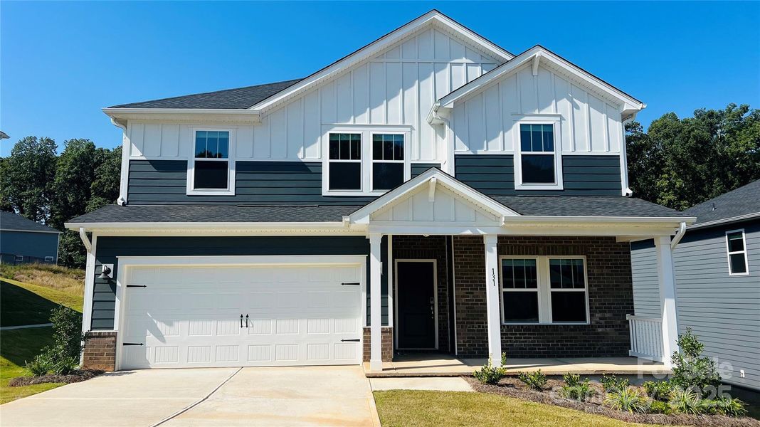 Front exterior of a home in the Sutter's Mill community, located in Mooresville, NC (Image 9).