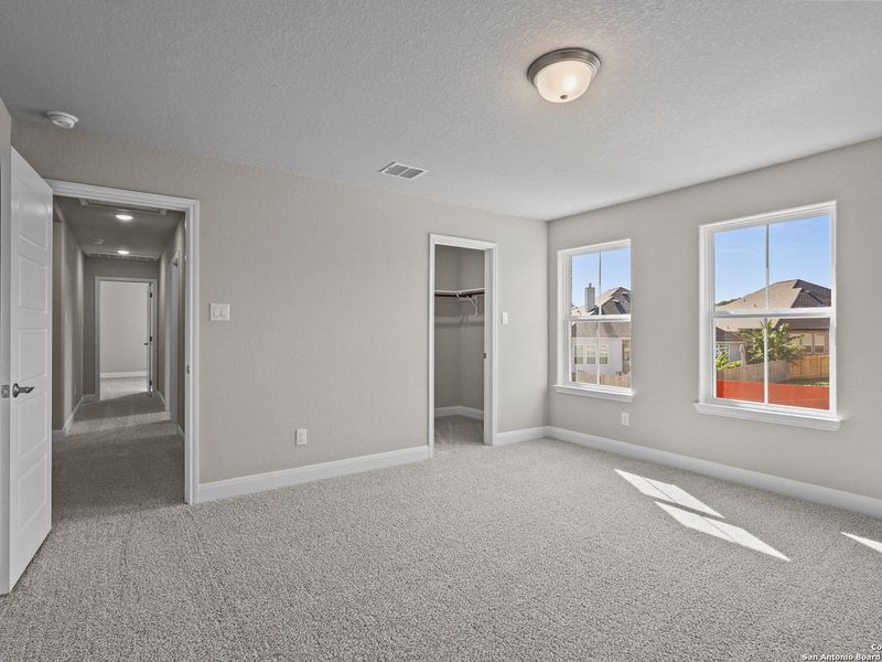 Spacious, unfurnished interior of a new home in The Reserve at Potranco Oaks, Castroville (Image 37).