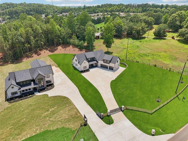 Front exterior of a new home in , Braselton, GA, highlighting curb appeal (Image 45). Front exterior of a new home in , Braselton, GA, highlighting curb appeal (Image 45).