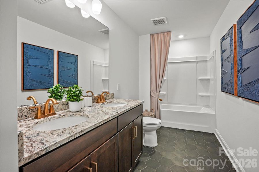 Furnished interior view inside a new home in Riverstone, Monroe (Image 20).