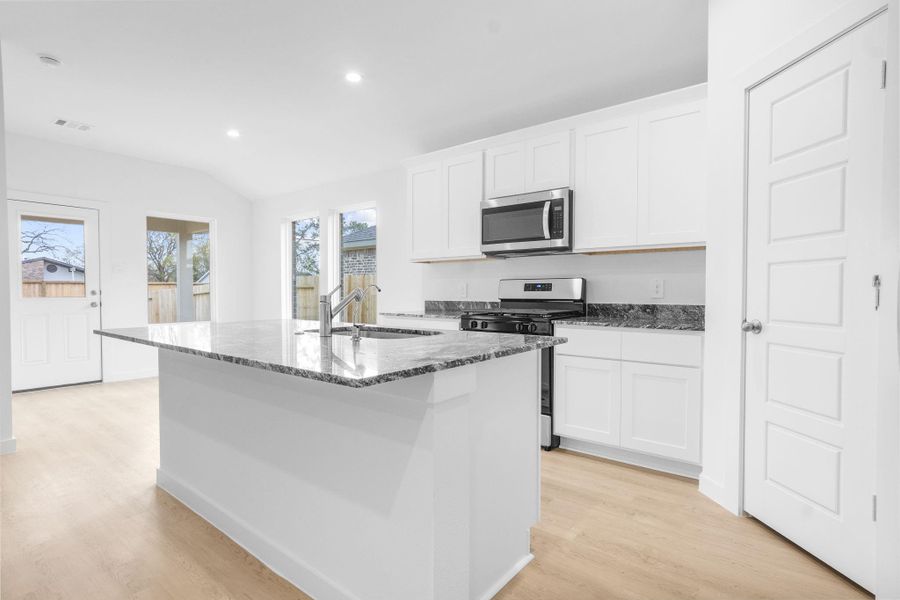 Furnished interior view inside a new home in Riverwood Ranch, Angleton (Image 5).