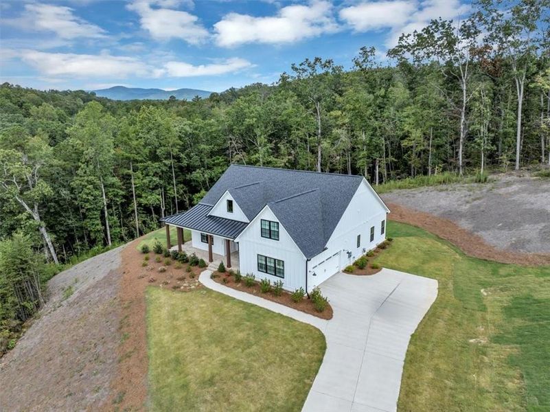 Front exterior of a new home in , Ball Ground, GA, highlighting curb appeal (Image 28).