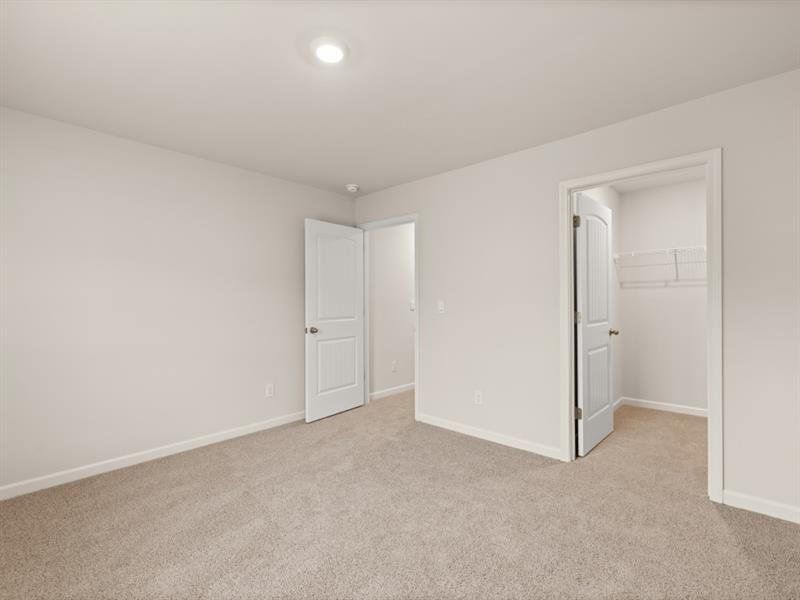 Spacious, unfurnished interior of a new home in Northwoods at Mirror Lake, Villa Rica (Image 43).