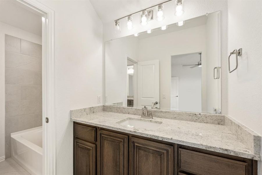 Furnished interior view inside a new home in Country Lakes, Denton (Image 19).