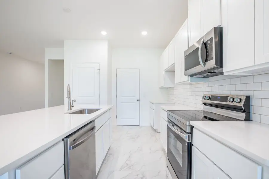Representative furnished interior of a home built from the Clearwater by Maronda Homes in Vero Lake Estates, Vero Beach (Image 6).