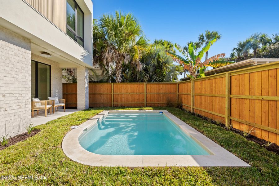 Exterior details and patio area of a home in , Atlantic Beach (Image 3).