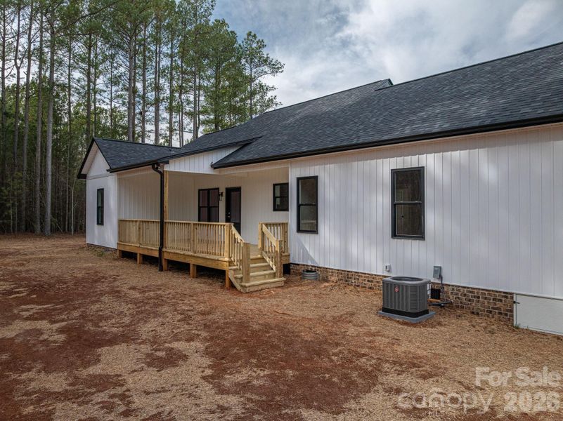 Exterior details and patio area of a home in , Vale (Image 3).