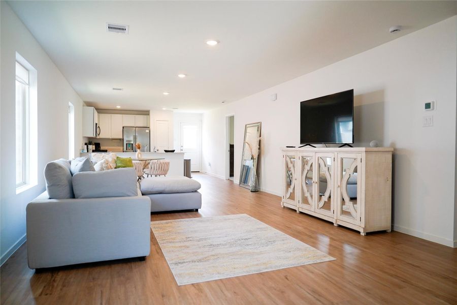Furnished interior view inside a new home in Sunterra, Katy (Image 24).