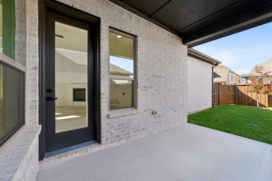 Exterior details and patio area of a home in Mantua Point Gardens, Van Alstyne (Image 2). Exterior details and patio area of a home in Mantua Point Gardens, Van Alstyne (Image 2).