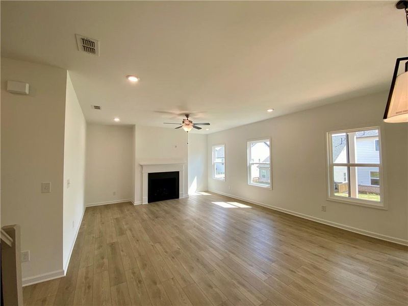 Spacious, unfurnished interior of a new home in Eastlyn Crossing, Flowery Branch (Image 17).