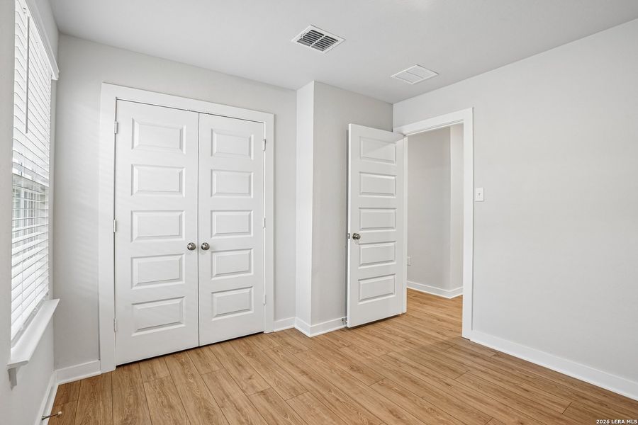 Spacious, unfurnished interior of a new home in University Village, San Antonio (Image 23).