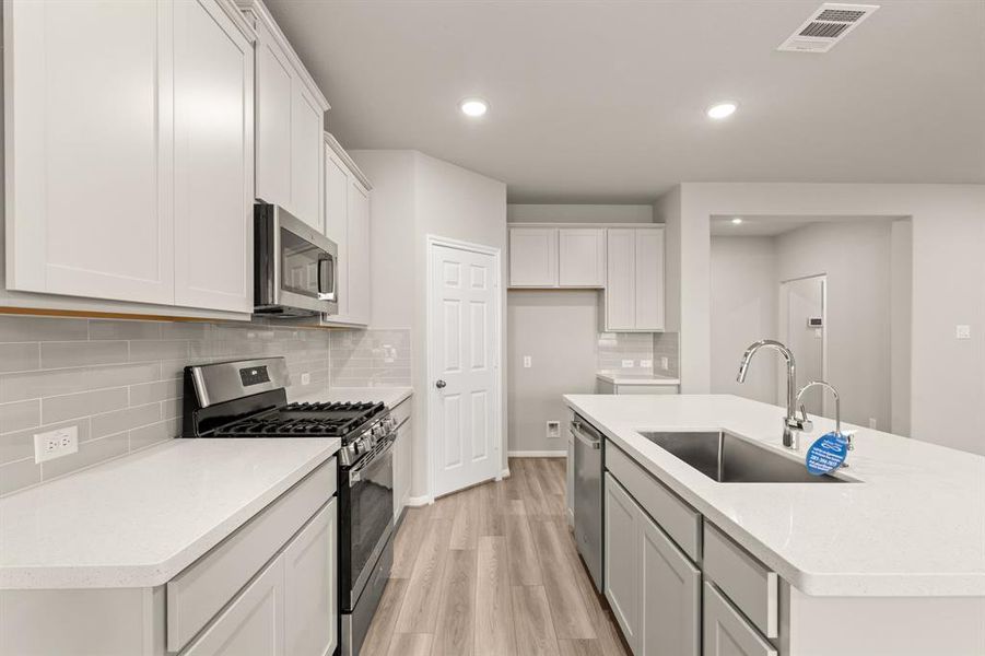 This kitchen is not only a functional space but also has ample storage. Whether you're a seasoned chef or just love to gather and enjoy good food, this kitchen is a dream come true.