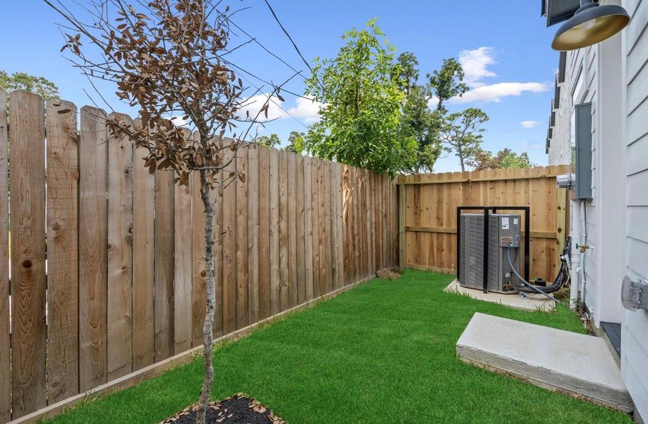 Exterior details and patio area of a home in , Houston (Image 3).