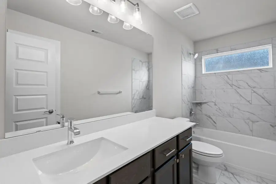 Furnished interior view inside a new home in Briarwood Crossing, Rosenberg (Image 11).