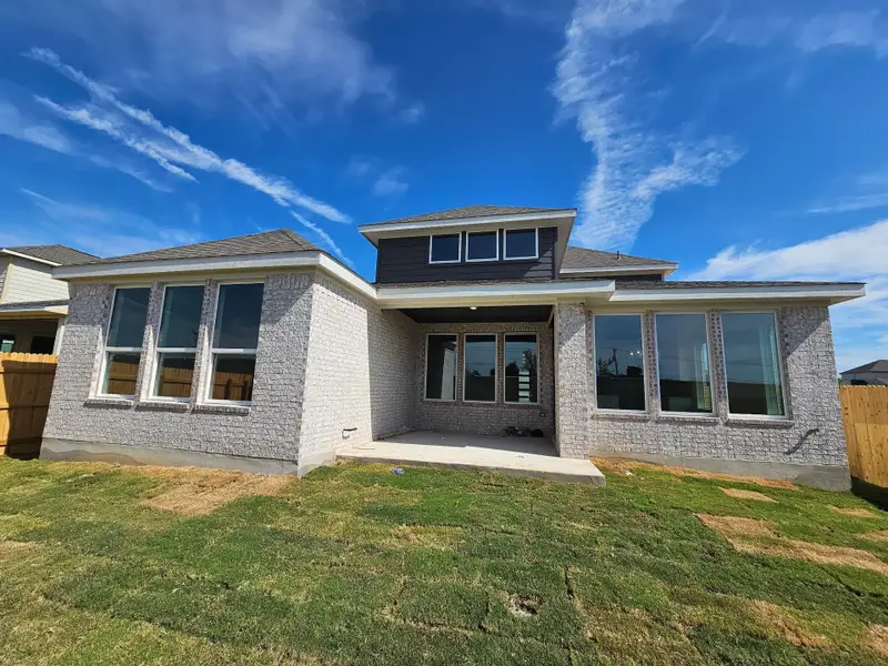 Exterior details and patio area of a home in Blackhawk in Pflugerville, Pflugerville (Image 4).