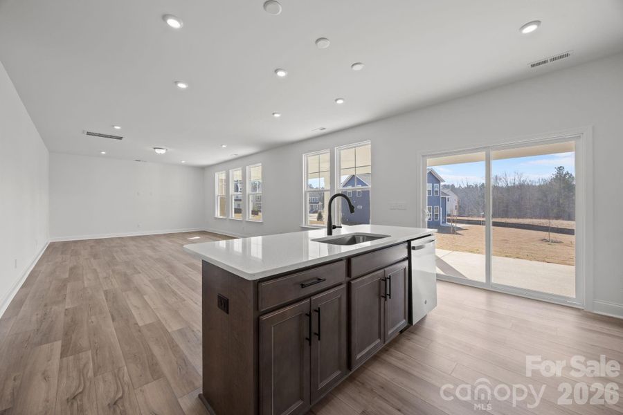 Kitchen/Family RoomPhotos are representative and may not reflect the exact home, finishes, or features.