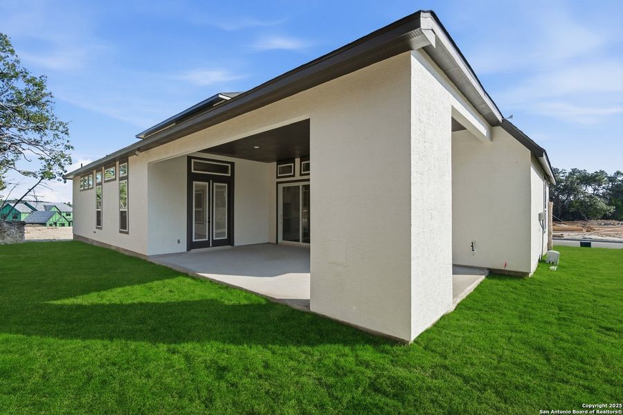 Exterior details and patio area of a home in Caliza Reserve, Boerne (Image 4).