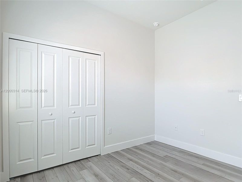Spacious, unfurnished interior of a new home in , Port Charlotte (Image 28).