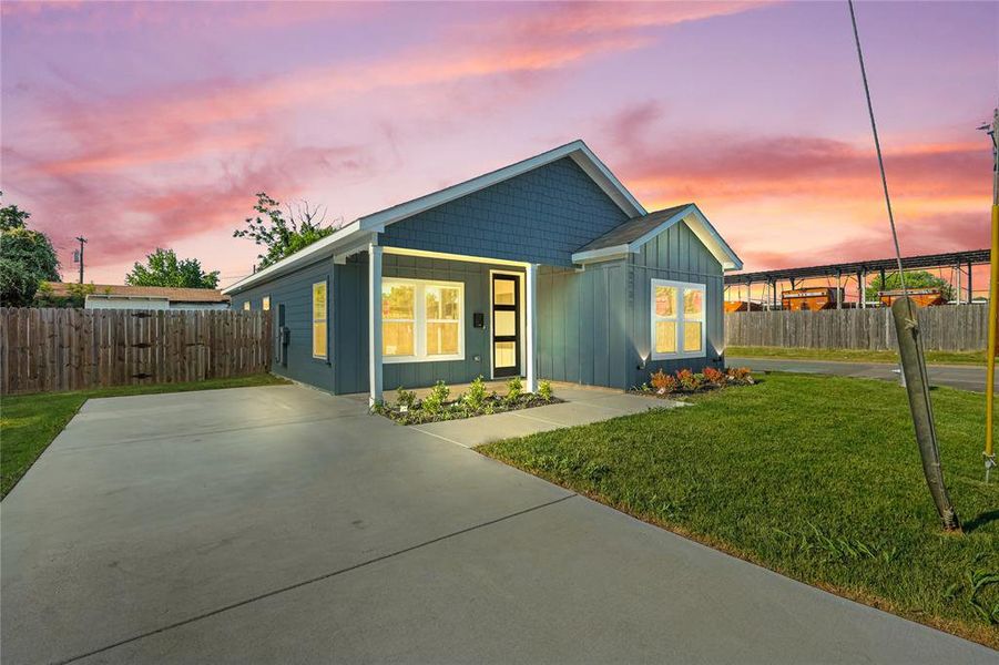 Front exterior of a new home in , Dallas, TX, highlighting curb appeal (Image 17).
