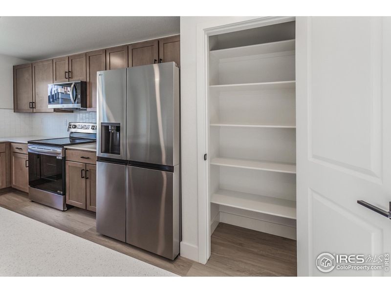 Furnished interior view inside a new home in , Fort Collins (Image 7).