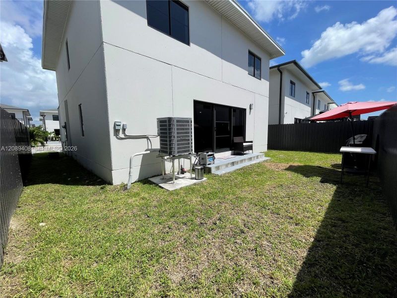 Exterior details and patio area of a home in , Florida City (Image 29).