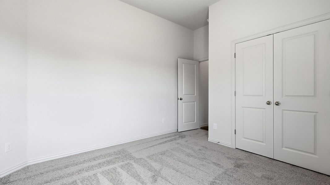 Furnished interior view inside a new home in Green Meadows Premier, Celina (Image 9).