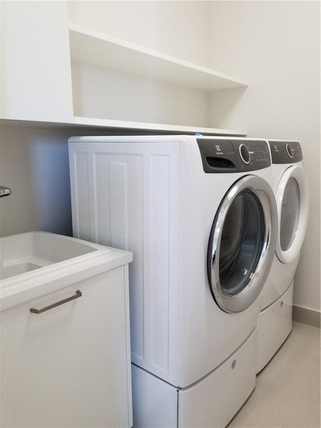 Photo from previously built Deerwood Model Home.  Laundry Room located upstairs