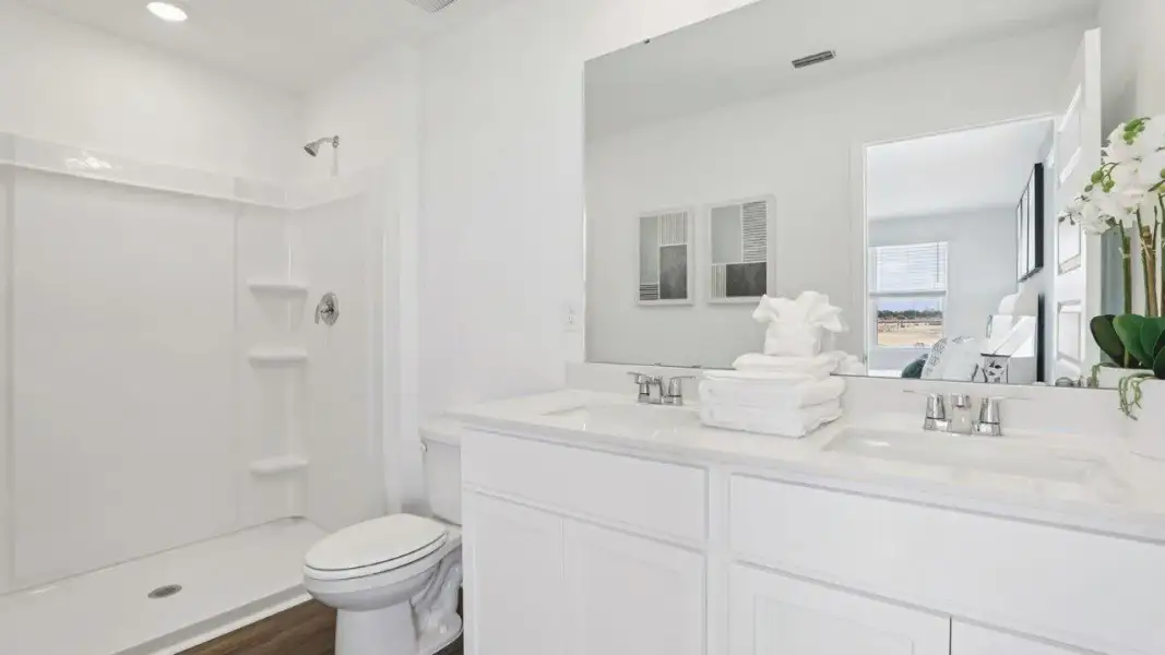 Furnished interior view inside a new home in Atria at Ridgewood Lakes, Davenport (Image 17).