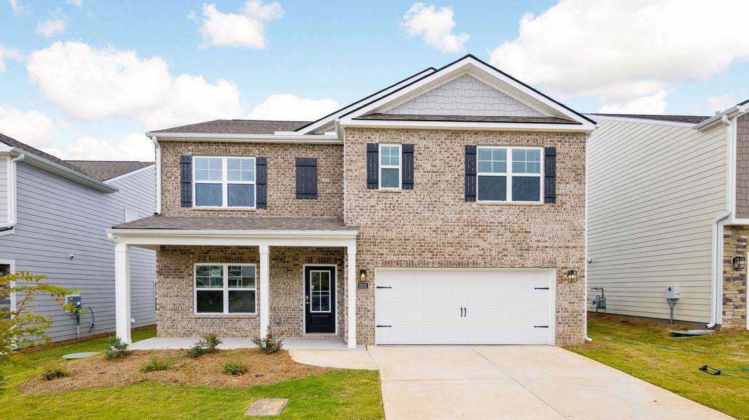 Front exterior of a new home in Harbor Crest, Ooltewah, TN, highlighting curb appeal (Image 1).