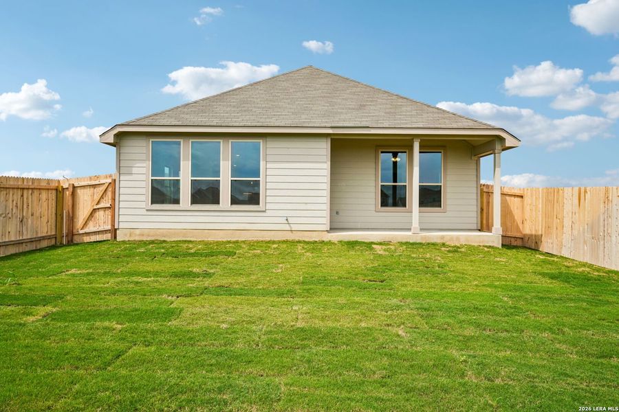 Exterior details and patio area of a home in Prairie Green, Converse (Image 19).