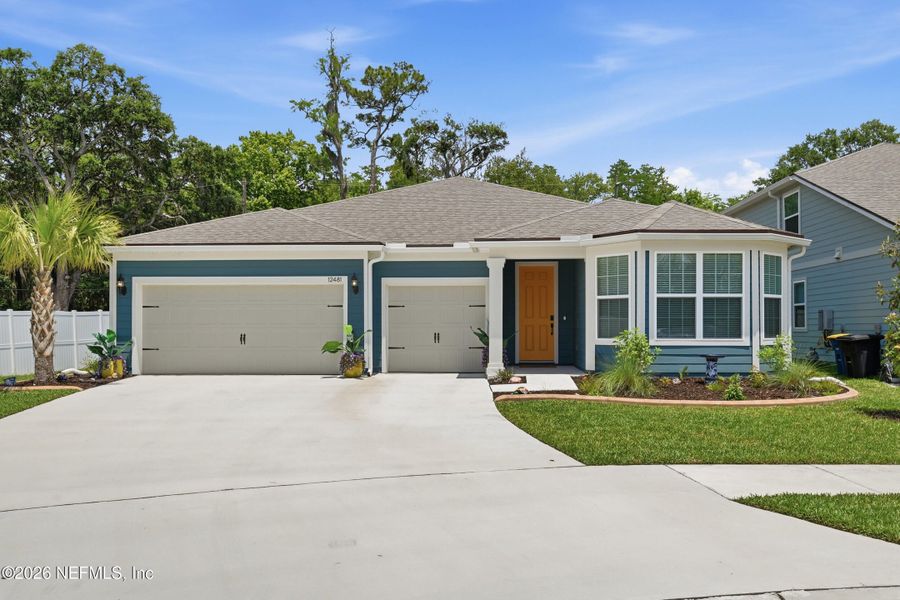 Front exterior of a new home in , Jacksonville, FL, highlighting curb appeal (Image 27).