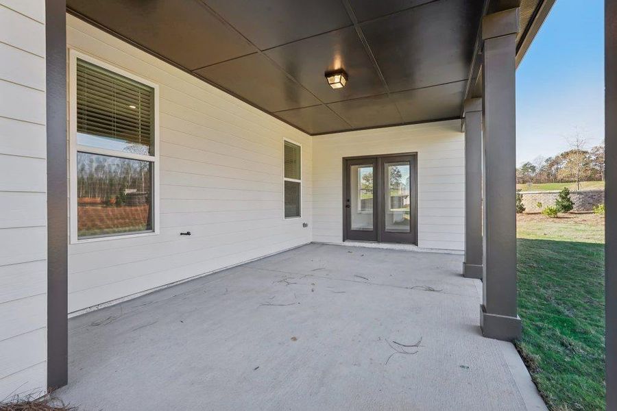 Exterior details and patio area of a home in Pinecrest Ridge, Dacula (Image 2). Exterior details and patio area of a home in Pinecrest Ridge, Dacula (Image 2).