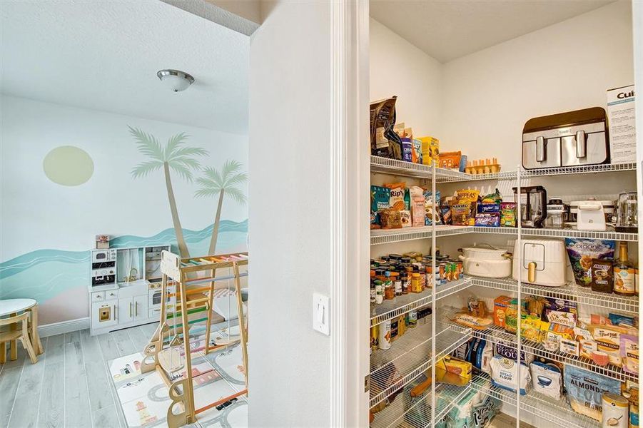 Furnished interior view inside a new home in Legends Preserve - Reserve Series, Daytona Beach (Image 15).