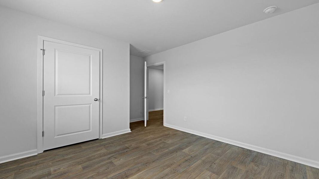Spacious, unfurnished interior of a new home in Pine Hills at Cane Bay, Summerville (Image 18).
