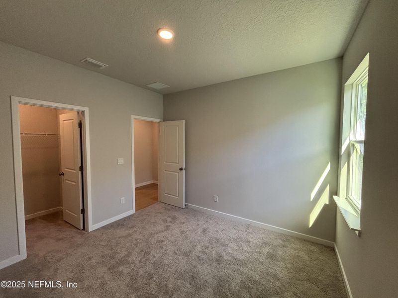 Spacious, unfurnished interior of a new home in The Magnolia Series at Reserve East, Flagler Beach (Image 22).