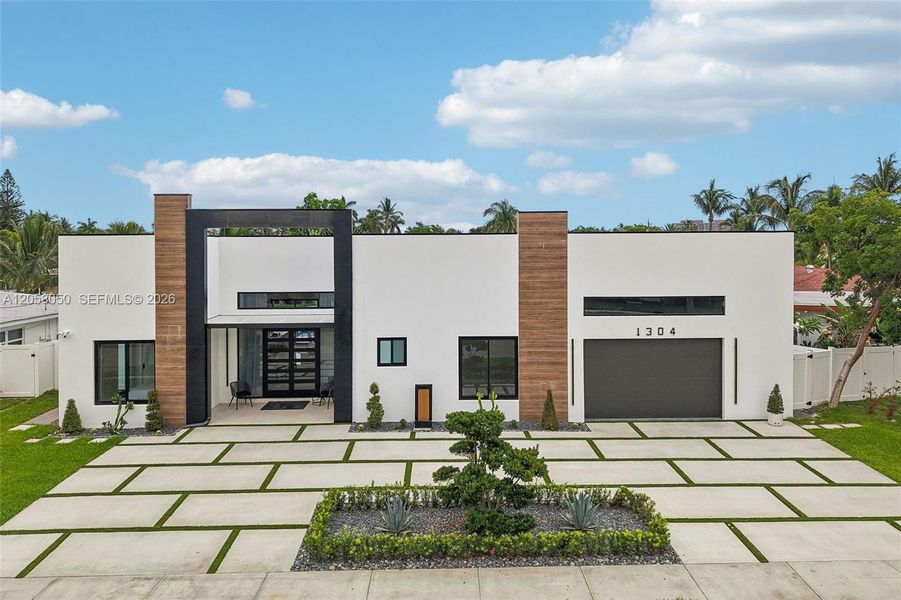 Front exterior of a new home in , Deerfield Beach, FL, highlighting curb appeal (Image 21). Front exterior of a new home in , Deerfield Beach, FL, highlighting curb appeal (Image 21).