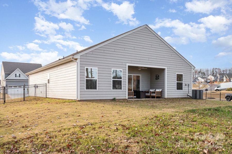 Exterior details and patio area of a home in , Troutman (Image 23).