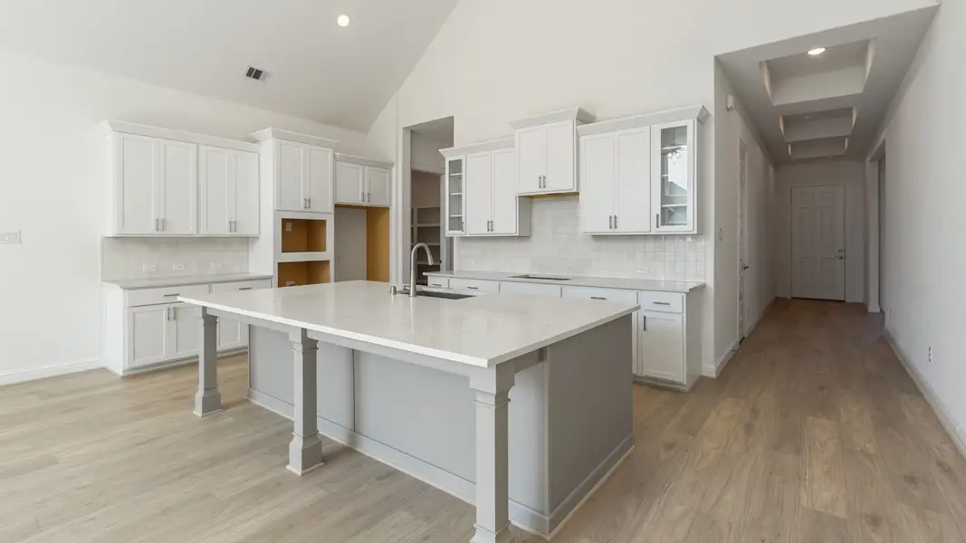 Representative furnished interior of a home built from the Vanderbilt by DRB Homes in Creekhaven, Iowa Colony (Image 6).