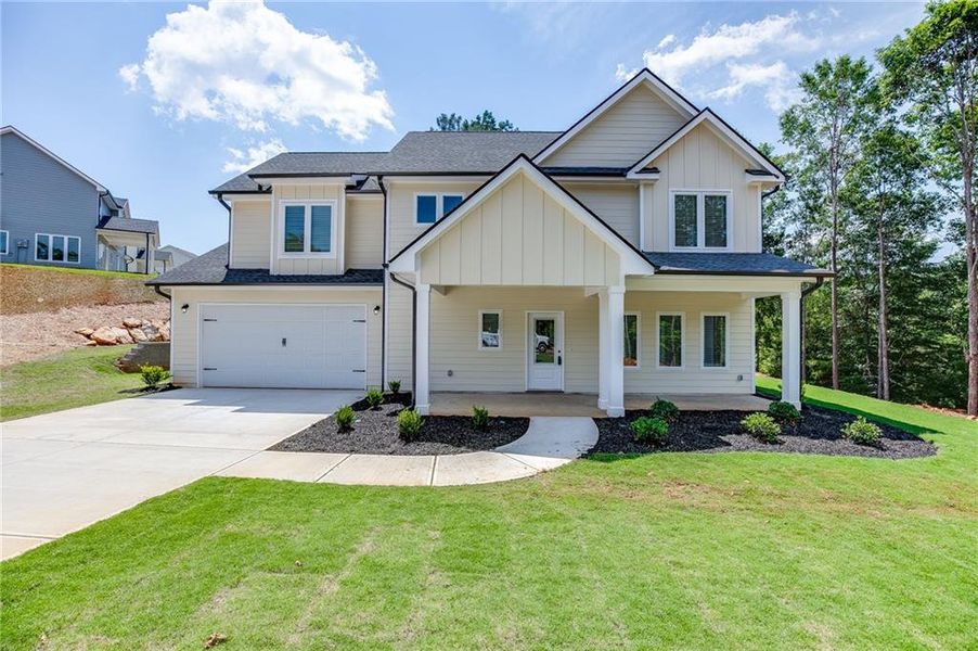 Front exterior of a new home in , Toccoa, GA, highlighting curb appeal (Image 1). Front exterior of a new home in , Toccoa, GA, highlighting curb appeal (Image 1).