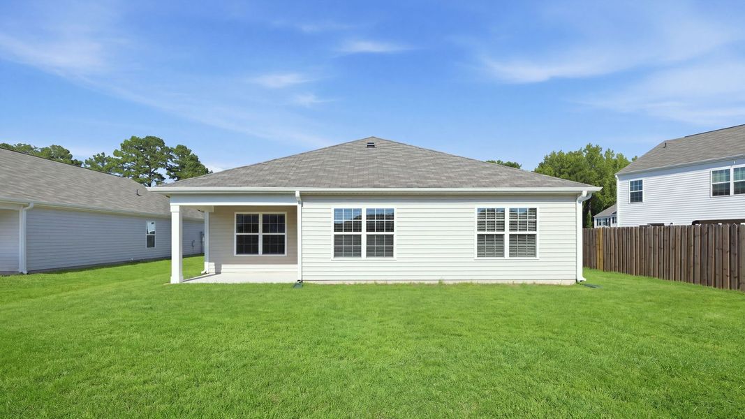 Exterior details and patio area of a home in Madeline Farm, New Bern (Image 21).