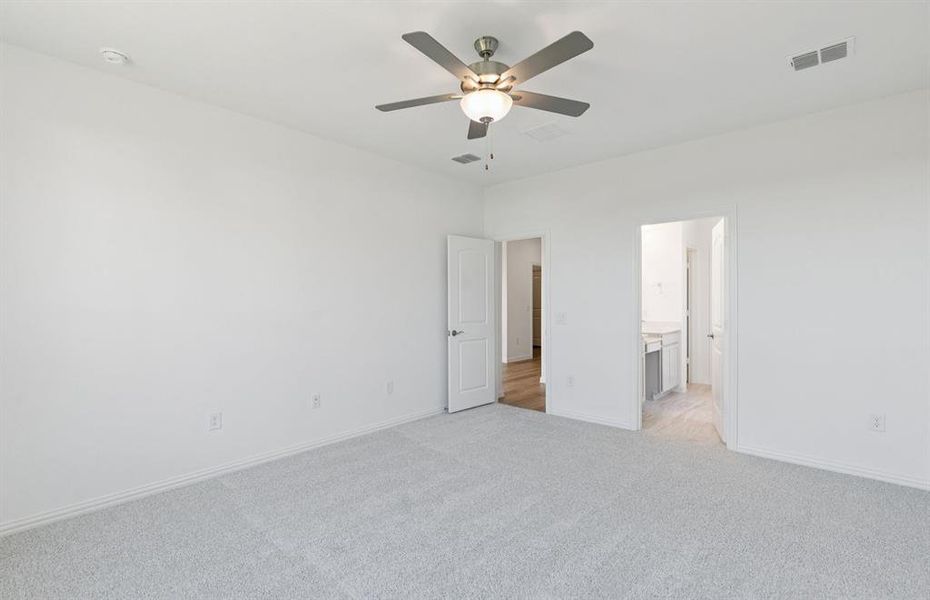 Spacious owner's suite with private bath