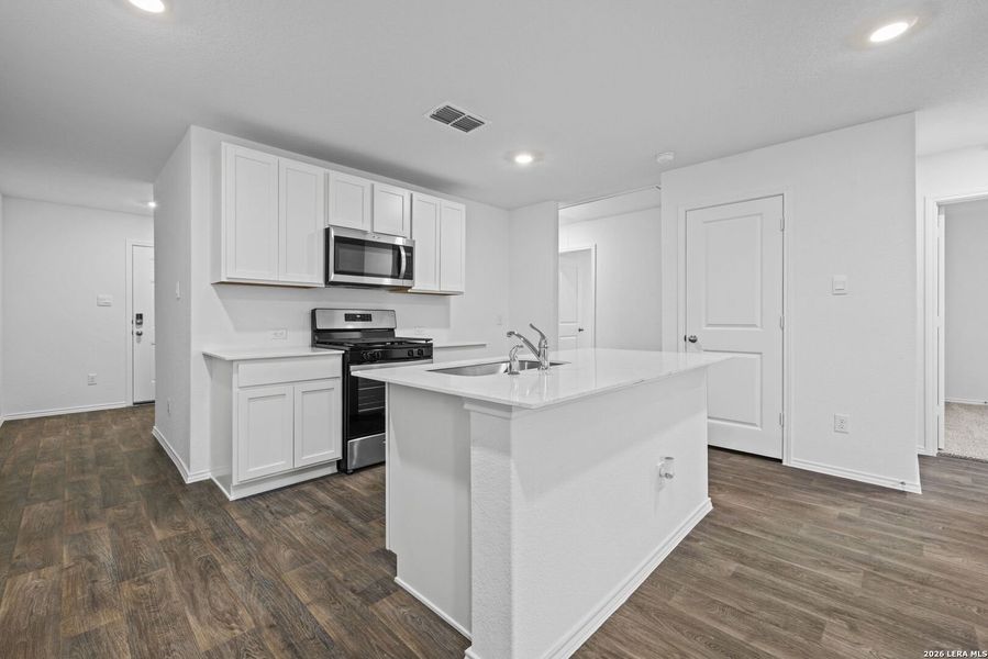 Furnished interior view inside a new home in Avenida, Converse (Image 7).