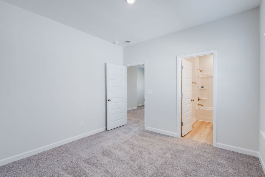 Spacious, unfurnished interior of a new home in Pebble Branch, Chapin (Image 46). Spacious, unfurnished interior of a new home in Pebble Branch, Chapin (Image 46).