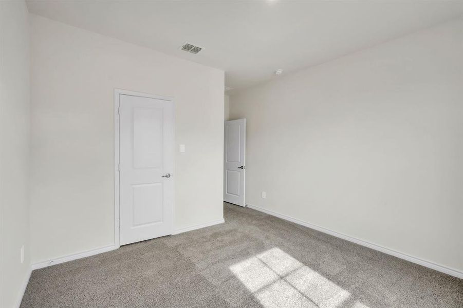 Spacious, unfurnished interior of a new home in The Landing at Hidden Lakes, McKinney (Image 26).