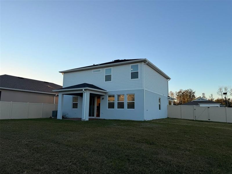 Exterior details and patio area of a home in Waterbrooke, Clermont (Image 26).