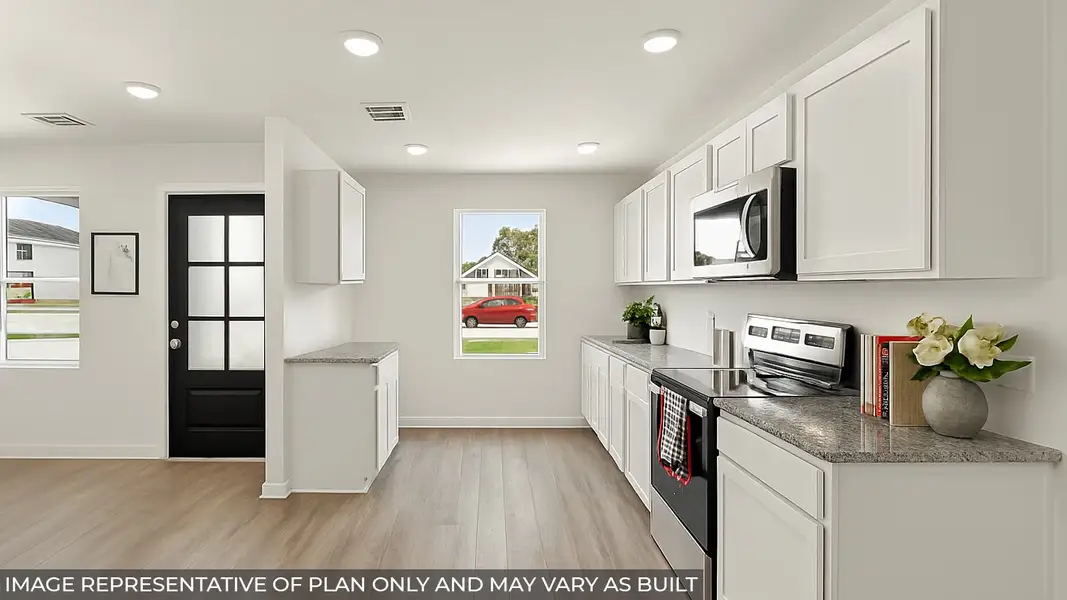 Furnished interior view inside a new home in William Trails, Willis (Image 4).