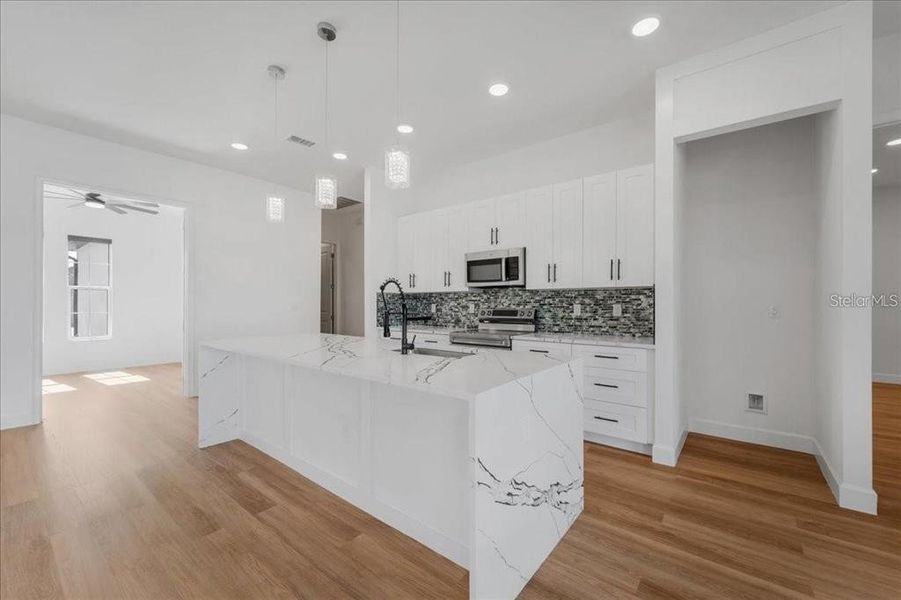 Furnished interior view inside a new home in , Port Charlotte (Image 12).