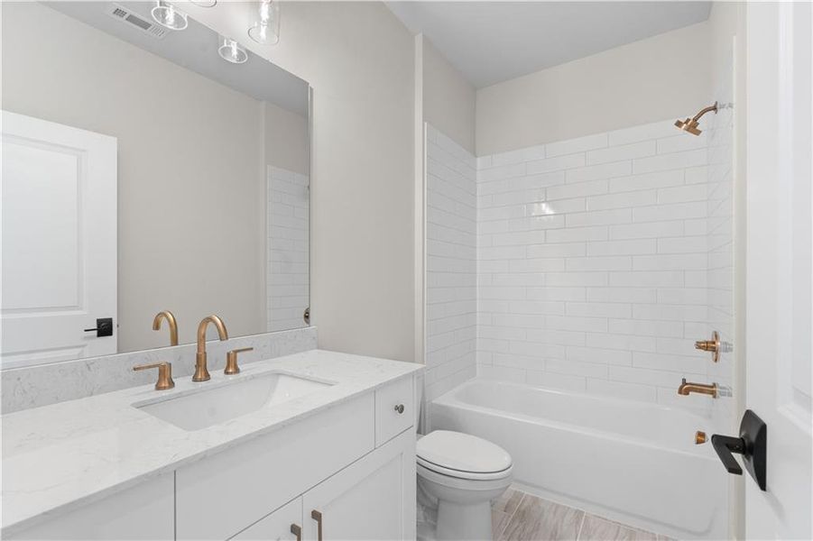 Furnished interior view inside a new home in Ward's Crossing Townhomes, Johns Creek (Image 4).